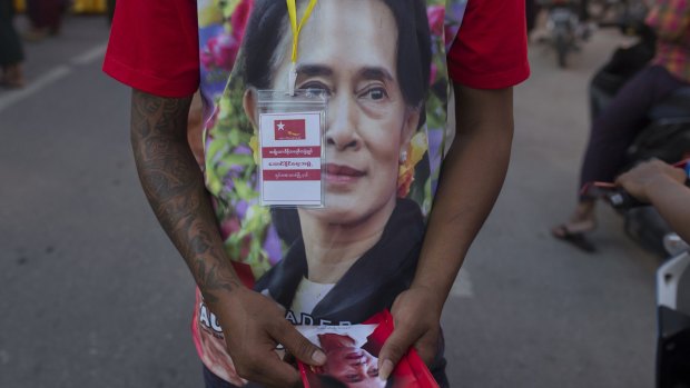 A supporter of Myanmar's opposition leader Aung San Suu Kyi's National League for Democracy party on Tuesday. 