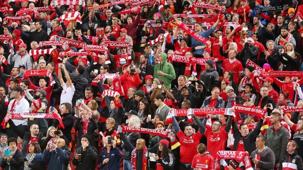 Liverpool FC  fans sing "You'll never walk alone" before the start of the international friendly match between Brisbane Roar and Liverpool FC at Suncorp Stadium on Friday.