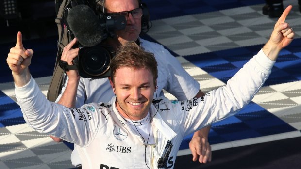 Winner: Mercedes driver Nico Rosberg of Germany celebrates after taking out the Australian Formula One Grand Prix at Albert Park in Melbourne, Australia, (AP Photo/Rob Griffith)