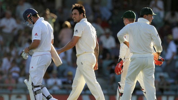 Mitchell Johnson of Australia exchanges words with England's Andrew Strauss during the Ashes match at the WACA in 2010. 