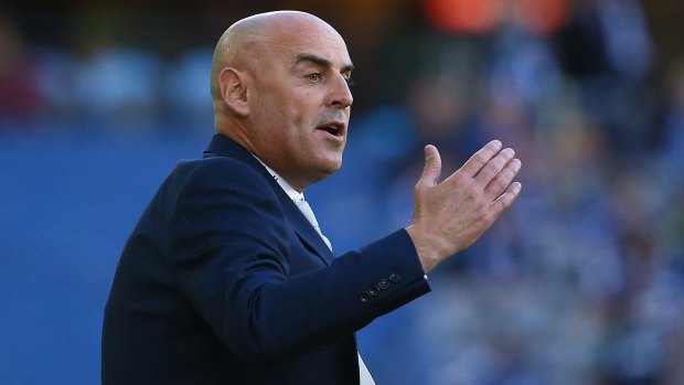 Victory coach Kevin Muscat urges his team on against Adelaide United.