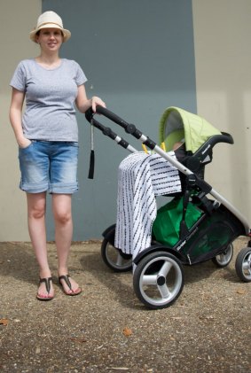 News
Emma Paton, with her six-week-old son Wyatt, says one of the things she likes about Supabarn is that it doesn't have self-serve counters so preserves more jobs.