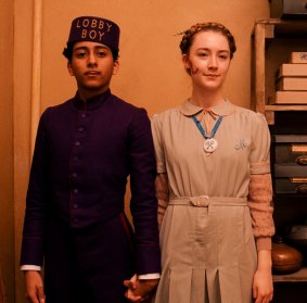 Tony Revolori and Saoirse Ronan in <i>Grand Budapest Hotel</i>.