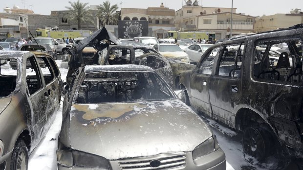 Damaged cars outside the Shiite mosque in Dammam.