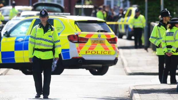 Police in Chorlton, south Manchester.