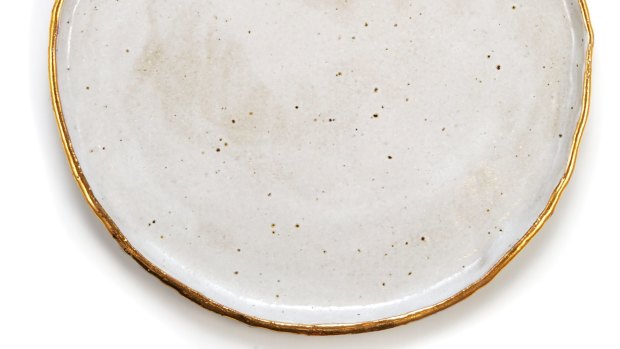 Stoneware platter with gold rim, $79.