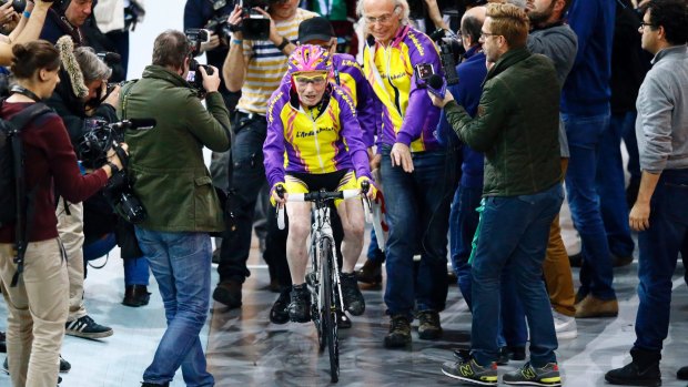 French cyclist Robert Marchand, aged 105, prepares to warm up prior to cycle in a bid to beat his record for distance cycled in one hour, at the velodrome of Saint-Quentin en Yvelines, outside Paris.