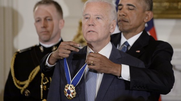 Joe Biden was openly emotional as Barack Obama presented him with the Medal of Freedom.