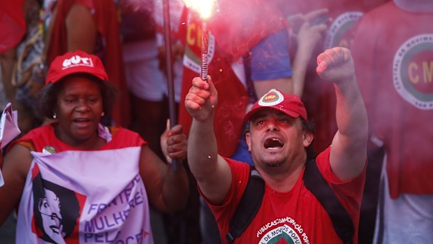 Demonstrators march in support of President Dilma Rousseff and former president Luiz Inacio Lula da Silva in Sao Paulo on Thursday.