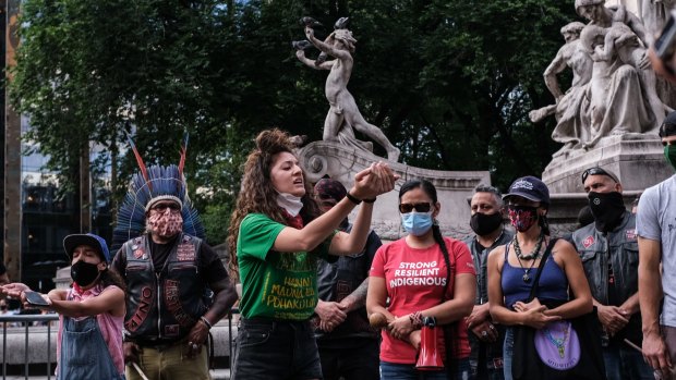 Members of the The Indigenous People's Day New York City Committee protest at the statue of Christopher Columbus last year, calling for Columbus Day be changed to Indigenous People's Day.
