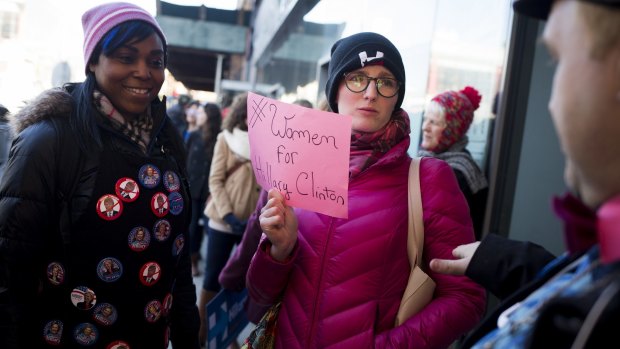 Attendees stand outside before the start of a campaign event with Hillary Clinton in New York on Wednesday.