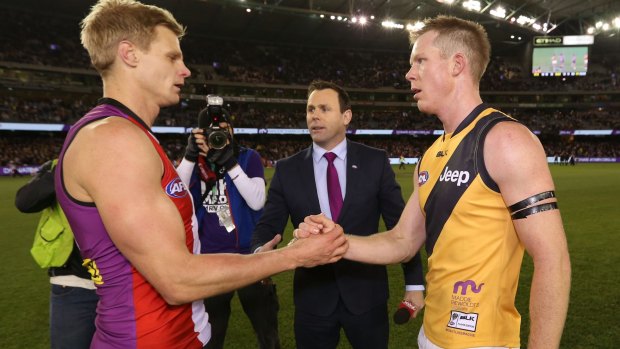 Nick Riewoldt and Jack Riewoldt shake hands after the final siren 
