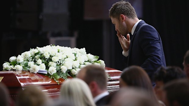 Funeral: Michael Clarke pays his respects.