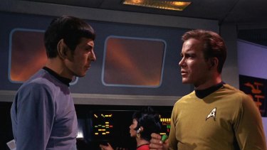 Leonard Nimoy as Mr Spock and William Shatner as Captain James T. Kirk appear in the first episode of <i>Star Trek</i>, which aired on September 8, 1966. Behind them is Uhura, played by Nichelle Nichols.