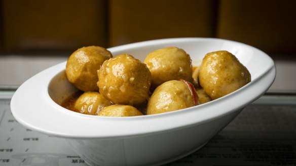 Fish balls in curry sauce.