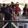 American golfer Jason Kokrak plays the ball from second floor of a hospitality tent at Wells Fargo