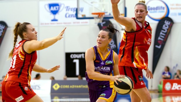 Kate Gaze (left) hopes to bring the winning mentality she was part of at Townsville Fire to the Canberra Capitals. 