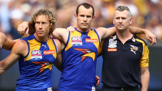 Matt Priddis, captain Shannon Hurn and coach Adam Simpson.