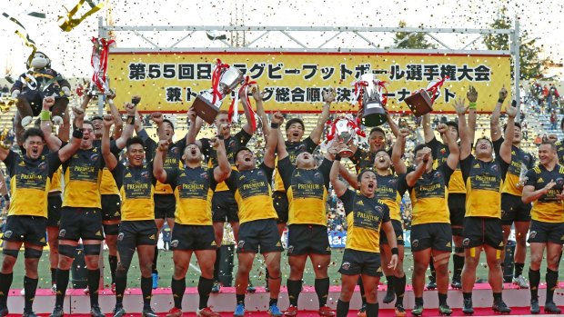 Suntory Sungoliath celebrate defending their title after beating Panasonic Wild Knights 12-8 in the Top League final.