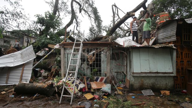 A house left destroyed in the wake of Typhoon Koppu in Quezon, north of Manila.