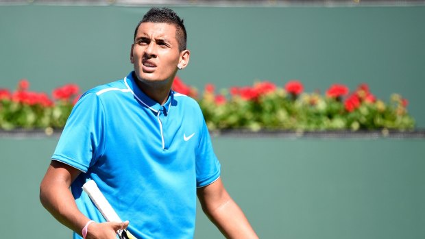 Nick Kyrgios reacts after losing a point during his match against Grigor Dimitrov.