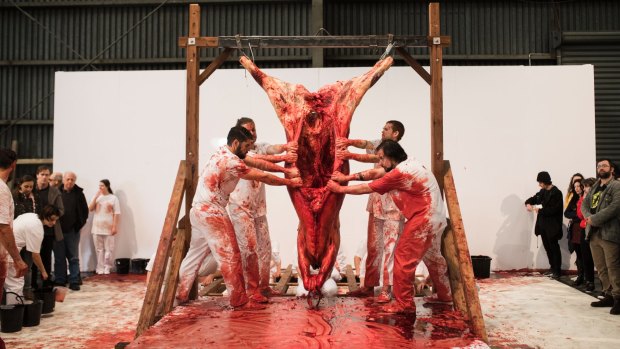 Hermann Nitsch and a team of performers staged their controversial 'action'. 