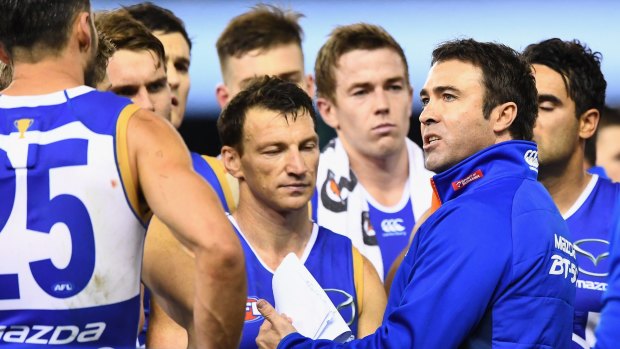 Hot water: North Melbourne coach Brad Scott questioned the umpires' integrity. 