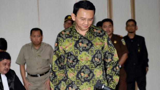 Jakarta Governor Basuki "Ahok" Tjahaja Purnama takes his seat for his court hearing in Jakarta on Thursday.
