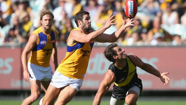 Eagle eye: Jack Darling competes with Alex Rance.