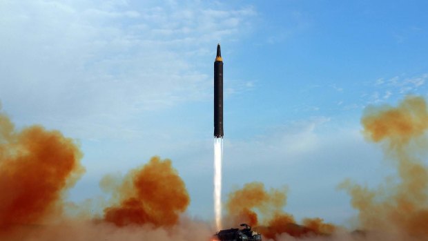 This undated file photo distributed by the North Korean government shows what was said to be the test launch of an intermediate range Hwasong-12 in North Korea. 