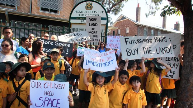Parents and children protest at Homebush West Public school where children have been banned from running due to overcrowding. 