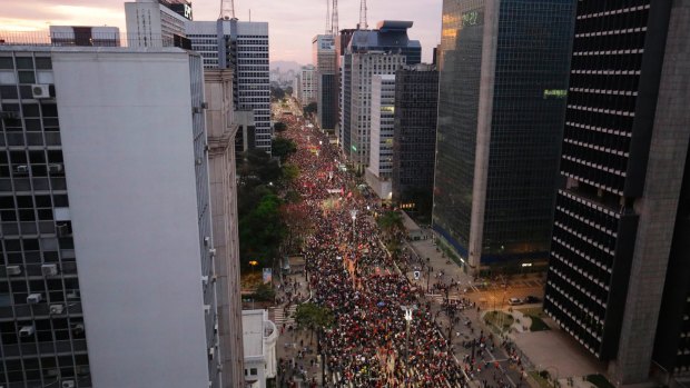Demonstrators march in Sao Paolo.