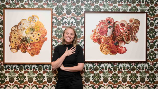 Artists Elizabeth Willing with some of her works at the Tastes Like Sunshine exhibition at the Museum of Brisbane.