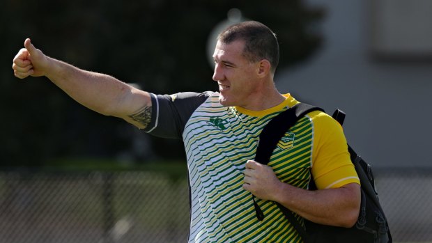 Thumbs up: Paul Gallen arrives at a training session in Newcastle.