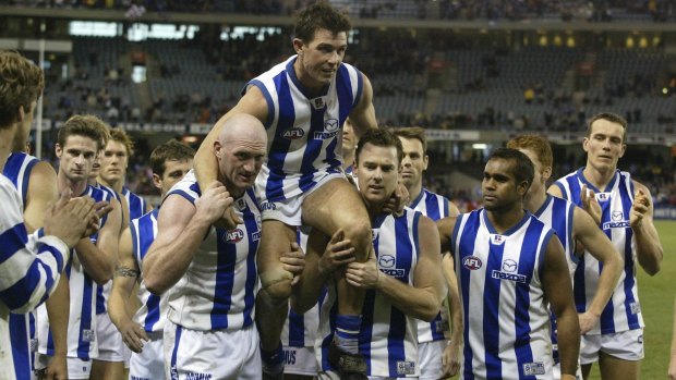 Anthony Stevens is carried off by team mates after playing in his 250th game 