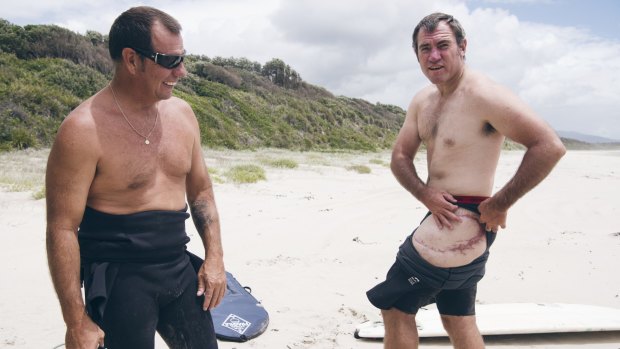 Dave Pearson (at left) with fellow shark attack survivor Dale Carr.