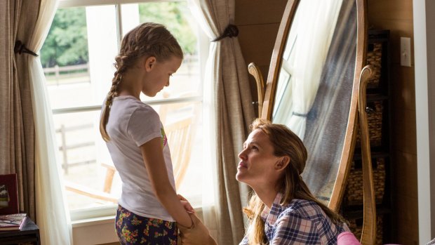 Christy (Jennifer Garner), right, assures Anna (Kylie Rogers) that everything will be all right in Miracles from Heaven.