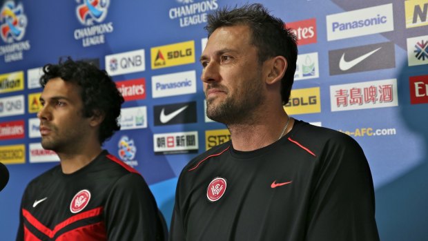 Newcastle signing Nikolai Topor-Stanley, left, will use his experience of working with Wanderers coach Tony Popovic to help his new club.