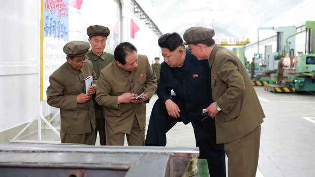 This undated picture released by North Korea's official news agency shows North Korean leader Kim Jong Un inspecting the Ryongsong machine complex in South Hamgyong province. 