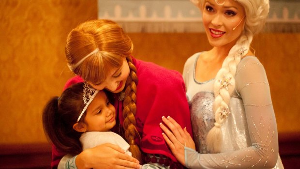 Three-year-old Samara Muir, who was racially vilified at a Disney <i>Frozen</i> event in May, attends a Melbourne high tea to meet the Norwegian sisters she adores, 'Anna' and 'Elsa'.