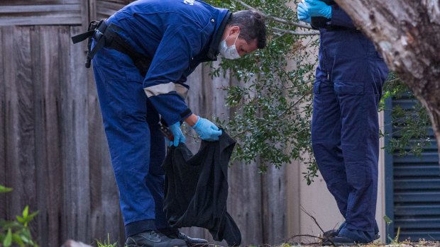 Police search a park near where Paul Costa's car was found.