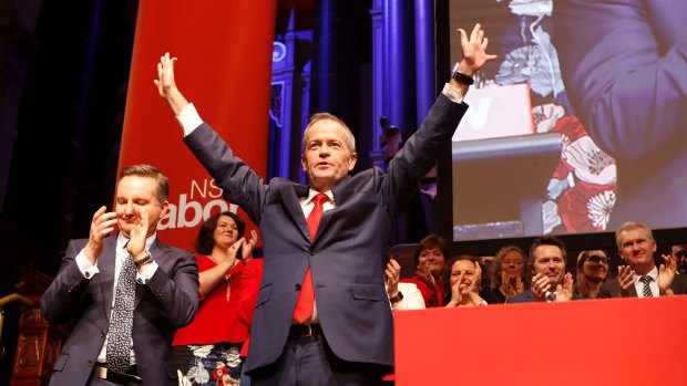 Opposition Leader Bill Shorten greets the crowd after his NSW Labor Party Conference speech on Sunday.