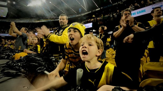 Richmond supporters Gabe Lewis, 11, and Sebastian Almeida, 5, at the VFL grand final.