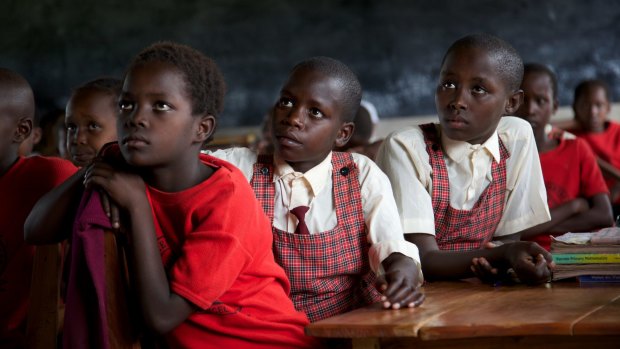 Young Maasai girls listen intently during classes at the Kakenya Centre for Excellence. Their parents have had to agree to leave them unharmed.
