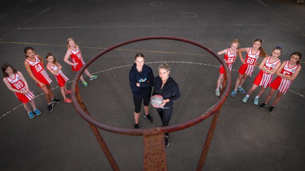 Carly Kluge, president of the Parkside Netball Club, with players. 