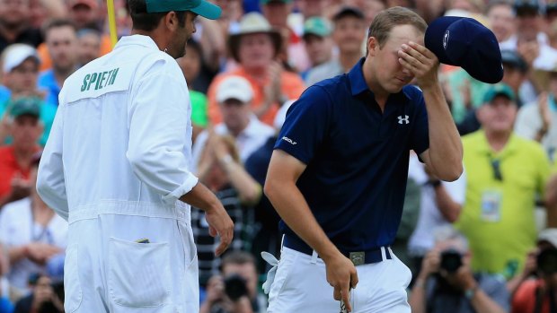 Jordan Spieth celebrates with his caddie Michael Greller after his Masters victory, but has not fared so well in his follow-up performance.