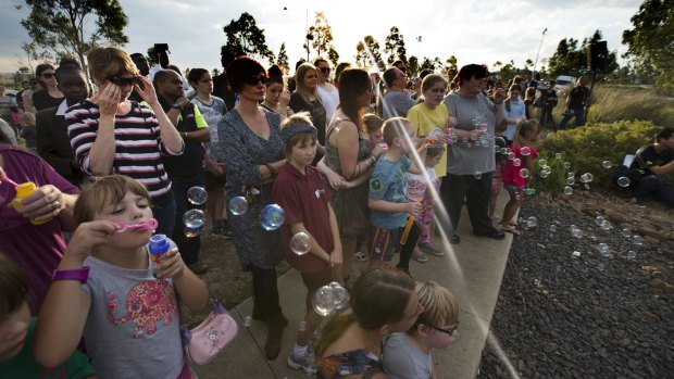 About 100 people gathered to farewell the victims at Lake Gladman.
