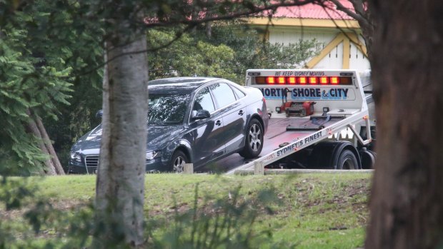 Police seize an Audi that was parked near Cabarita Wharf.