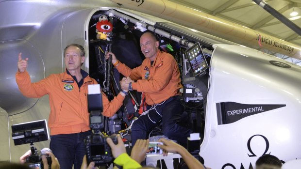Swiss pilots Andre Boschberg and Bertrand Piccard after their solar-powered plane touched down at Chongqing Jiangbei International Airport in south-western China.