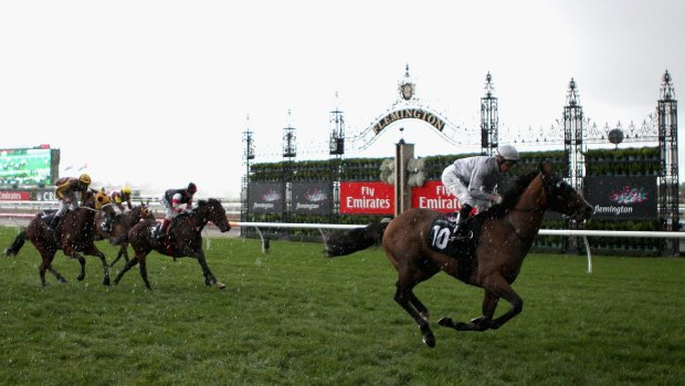In charge: Authoritarian races to victory for Daniel Moor in the VRC St Leger. 